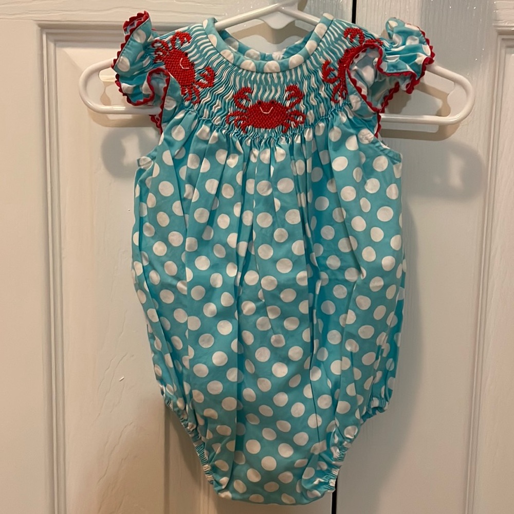 Southern Sunshine Kids polka dot bubble with crab smocking at neckline